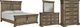 Signature Design by Ashley® Markenburg 4-Piece Brown Queen Panel Bed Set-0